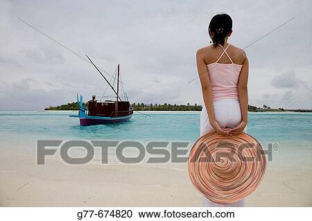 Stock Image - Maldives. South Male Atoll. Asian Woman.. Fotosearch