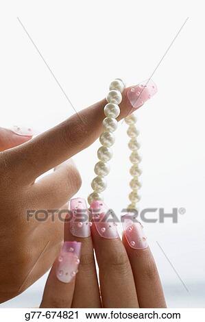 Stock Image - Maldives. South Male Atoll. Asian Woman.. Fotosearch