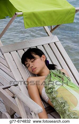 Stock Image - Maldives. South Male Atoll. Asian Woman.. Fotosearch