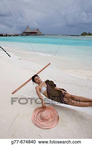 Maldives. South Male Atoll. Asian Woman. View Large Photo Image Stock Image - Maldives. South Male Atoll. Asian Woman.. Fotosearch