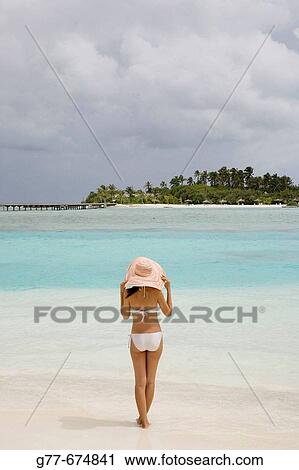 Stock Image - Maldives. South Male Atoll. Asian Woman.. Fotosearch
