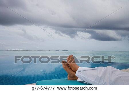 Stock Photo - Maldives. South Male Atoll. Asian Woman.. Fotosearch