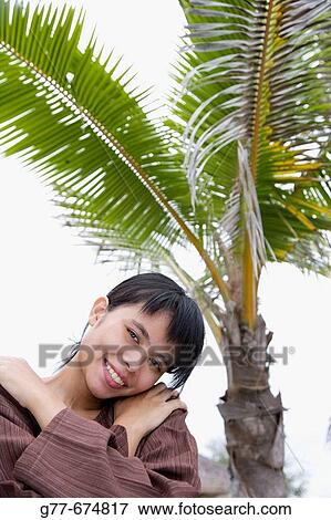 Maldives. South Male Atoll. Asian Woman. View Large Photo Image Stock Photo - Maldives. South Male Atoll. Asian Woman.. Fotosearch