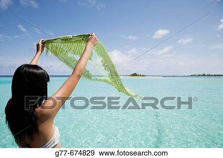 Maldives. South Male Atoll. Asian Woman. View Large Photo Image Stock Photo - Maldives. South Male Atoll. Asian Woman.. Fotosearch