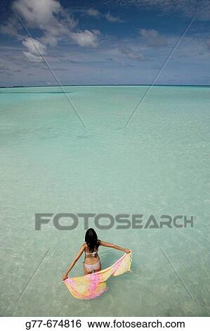Stock Photograph - Maldives. South Male Atoll. Asian Woman.. Fotosearch