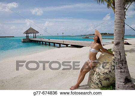 Maldives. South Male Atoll. Asian Woman. View Large Photo Image Stock Photograph - Maldives. South Male Atoll. Asian Woman.. Fotosearch