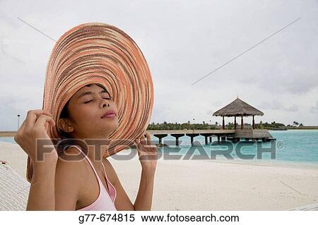 Maldives. South Male Atoll. Asian Woman. View Large Photo Image Stock Photography - Maldives. South Male Atoll. Asian Woman.. Fotosearch