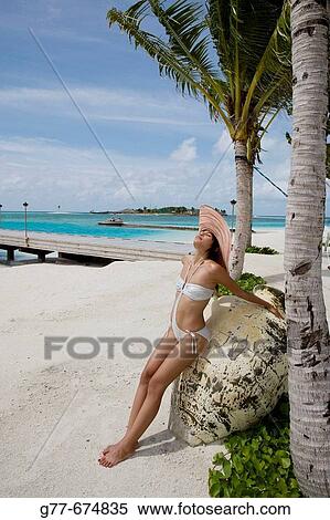 Stock Photography - Maldives. South Male Atoll. Asian Woman.. Fotosearch