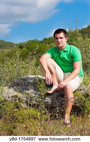 Male, 17, caucasian, in natural environment near Concan, Texas, USA View Large Photo Image Stock Photo - Male, 17, caucasian, in natural environment near Concan, Texas, USA. Fotosearch