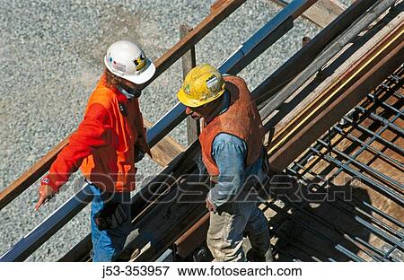 Male and female construction supervisors. I-880 Cypress project. Oakland, California. USA. View Large Photo Image Stock Photo - Male and female construction supervisors. I-880 Cypress project. Oakland, California. USA.. Fotosearch