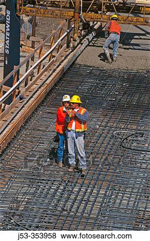 Male and female construction supervisors. I-880 Cypress project. Oakland, California. USA. View Large Photo Image Stock Photo - Male and female construction supervisors. I-880 Cypress project. Oakland, California. USA.. Fotosearch