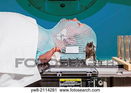 Male cancer patient lying under a linear accelerator or linac receiving radiation treatment. View Large Photo Image Stock Image - Male cancer patient lying under a linear accelerator or linac receiving radiation treatment.. Fotosearch