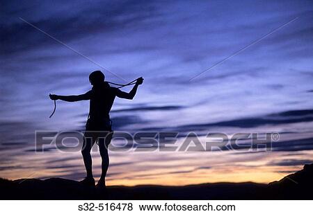 Male climber at sunset. Pearroya de Tastavins. Teruel. Arag? n. Spain View Large Photo Image Stock Photo - Male climber at sunset. Pearroya de Tastavins. Teruel. Arag? n. Spain. Fotosearch