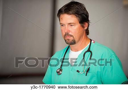 Male doctor, 51, in provisional clinic, Leakey, Texas, USA View Large Photo Image Stock Image - Male doctor, 51, in provisional clinic, Leakey, Texas, USA. Fotosearch
