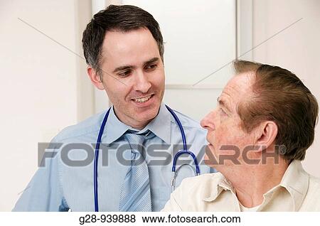 male doctor and senior male patient during a medical examination View Large Photo Image Stock Photo - male doctor and senior male patient during a medical examination. Fotosearch