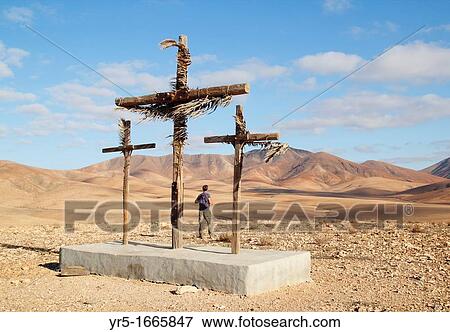 Male hiker near crosses on hill near Las Casitas on Fuerteventura, Canary Islands, Spain View Large Photo Image Stock Photo - Male hiker near crosses on hill near Las Casitas on Fuerteventura, Canary Islands, Spain. Fotosearch
