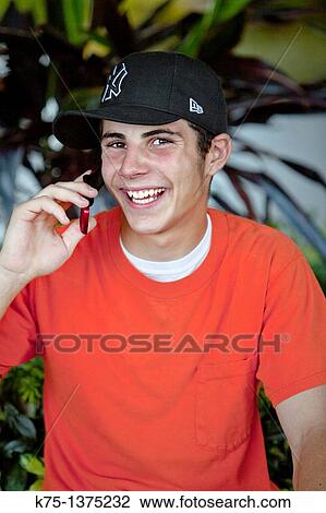 male teen on phone View Large Photo Image Stock Image - male teen on phone. Fotosearch