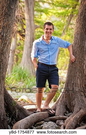 Male Teenager, 17 years old, caucasian, at the Frio River in Concan, Texas, USA View Large Photo Image Stock Photo - Male Teenager, 17 years old, caucasian, at the Frio River in Concan, Texas, USA. Fotosearch