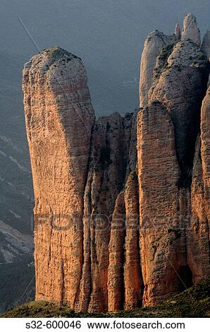 Mallos de Riglos. La Hoya de Huesca. Huesca province, Arag? n. Pyrenees Mountains, Spain View Large Photo Image Stock Photograph - Mallos de Riglos. La Hoya de Huesca. Huesca province, Arag? n. Pyrenees Mountains, Spain. Fotosearch