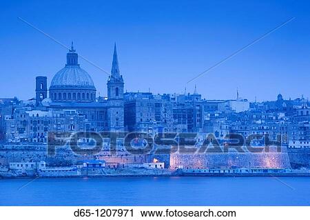 Malta, Valletta, city view with St Paul's Anglican Cathedral and Carmelite Church from Sliema, dusk View Large Photo Image Stock Image - Malta, Valletta, city view with St Paul's Anglican Cathedral and Carmelite Church from Sliema, dusk. Fotosearch