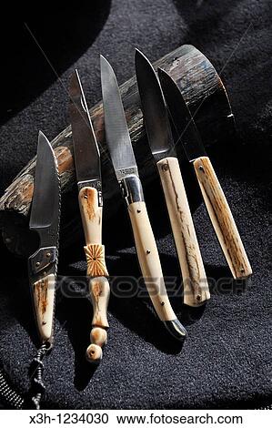 Mammoth bone handle knives, work of Renaud Aubry, cutler at Viscomtat, Livradois-Forez Regional Nature Park, Puy-de Dome department, Auvergne region, France, Europe View Large Photo Image Stock Image - Mammoth bone handle knives, work of Renaud Aubry, cutler at Viscomtat, Livradois-Forez Regional Nature Park, Puy-de Dome department, Auvergne region, France, Europe. Fotosearch