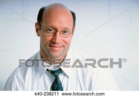 Man, 40-45, with tie loosened and shirt unbuttoned View Large Photo Image Stock Image - Man, 40-45, with tie loosened and shirt unbuttoned. Fotosearch