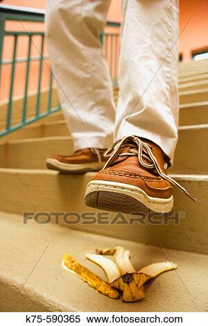 Man about to step on banana peel. View Large Photo Image Stock Photography - Man about to step on banana peel.. Fotosearch