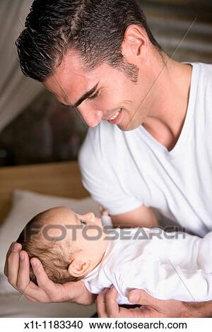Man and baby. View Large Photo Image Stock Image - Man and baby.. Fotosearch