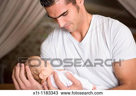 Man and baby. View Large Photo Image Stock Image - Man and baby.. Fotosearch