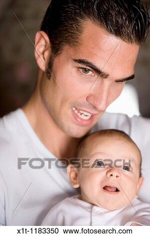 Man and baby. View Large Photo Image Stock Image - Man and baby.. Fotosearch