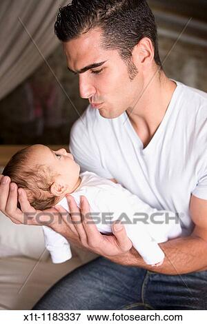 Man and baby. View Large Photo Image Stock Photo - Man and baby.. Fotosearch