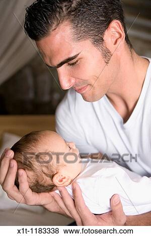 Man and baby. View Large Photo Image Stock Photo - Man and baby.. Fotosearch