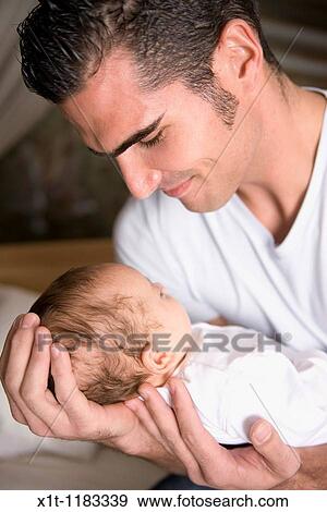 Man and baby. View Large Photo Image Stock Photo - Man and baby.. Fotosearch
