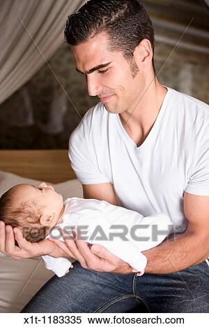 Man and baby. View Large Photo Image Stock Photography - Man and baby.. Fotosearch