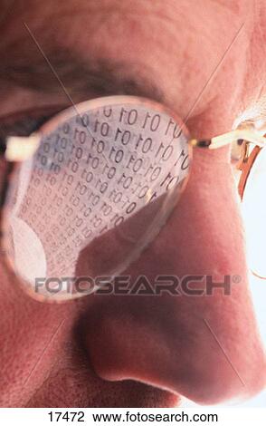 Stock Image - Man and binary code. Fotosearch
