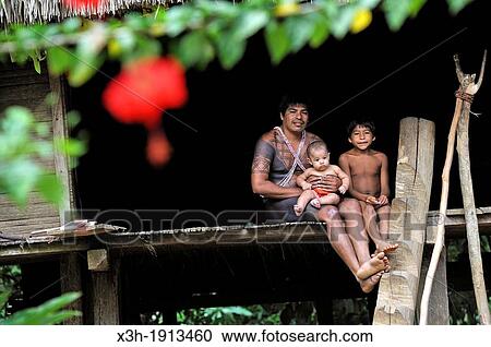 man and children of Embera native community living by the Chagres River within the Chagres National Park, Republic of Panama, Central America View Large Photo Image Stock Image - man and children of Embera native community living by the Chagres River within the Chagres National Park, Republic of Panama, Central America. Fotosearch