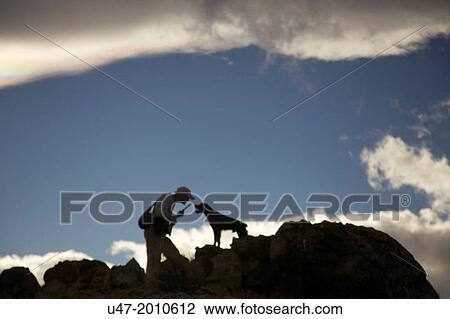 Man and his hunting dog share a moment. View Large Photo Image Stock Image - Man and his hunting dog share a moment.. Fotosearch
