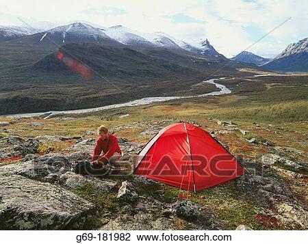 Man and tent. Sarek National Park. Lapland. Sweden View Large Photo Image Stock Image - Man and tent. Sarek National Park. Lapland. Sweden. Fotosearch