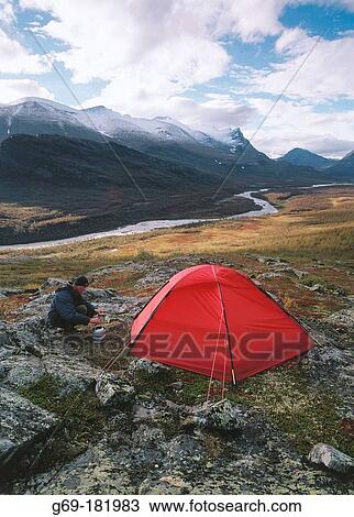 Man and tent. Sarek National Park. Lapland. Sweden View Large Photo Image Stock Image - Man and tent. Sarek National Park. Lapland. Sweden. Fotosearch