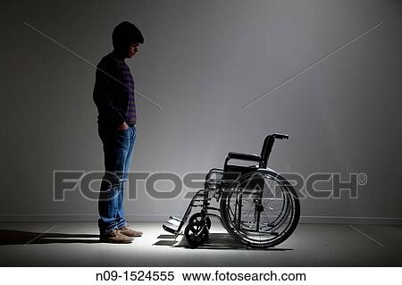 Man and wheelchair View Large Photo Image Stock Photography - Man and wheelchair. Fotosearch