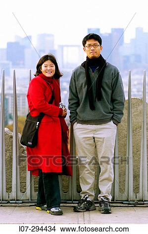 Picture - Man and woman at the top of the Arc de Triomphe. Paris. France. Fotosearch