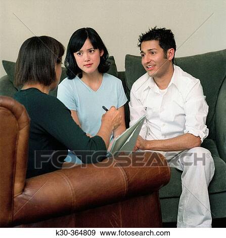 Man and woman in counseling session. View Large Photo Image Stock Photo - Man and woman in counseling session.. Fotosearch