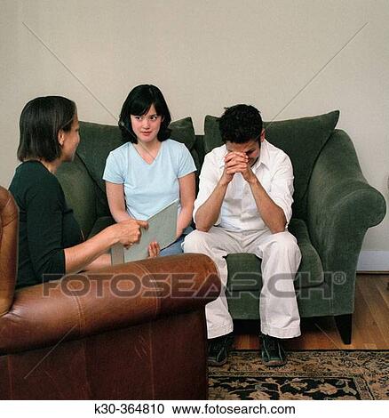 Man and woman in marriage counseling session. View Large Photo Image Stock Image - Man and woman in marriage counseling session.. Fotosearch