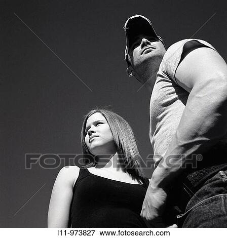 Man and woman looking away from each other View Large Photo Image Stock Photo - Man and woman looking away from each other. Fotosearch