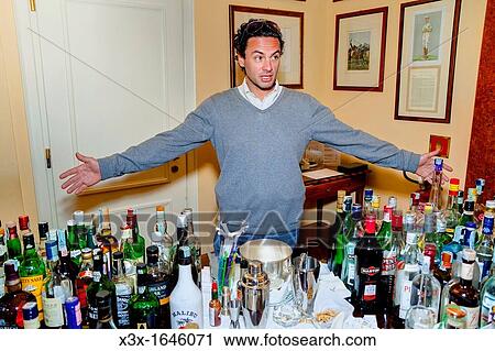 Man at a bar View Large Photo Image Stock Image - Man at a bar. Fotosearch