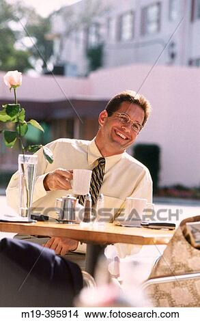 man at a cafe View Large Photo Image Picture - man at a cafe. Fotosearch