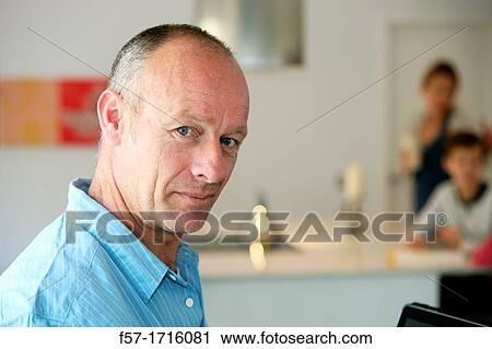 Man at home View Large Photo Image Stock Image - Man at home. Fotosearch