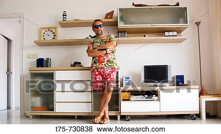 Man at home View Large Photo Image Stock Photo - Man at home. Fotosearch