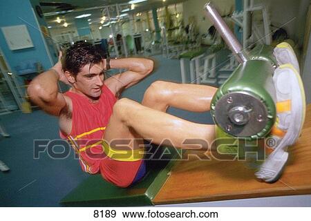 Man at the gym View Large Photo Image Stock Photo - Man at the gym. Fotosearch
