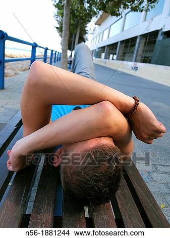 Man awakening on a bench View Large Photo Image Picture - Man awakening on a bench. Fotosearch